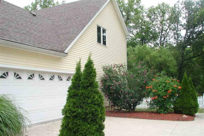 House Garage and Bushes.png